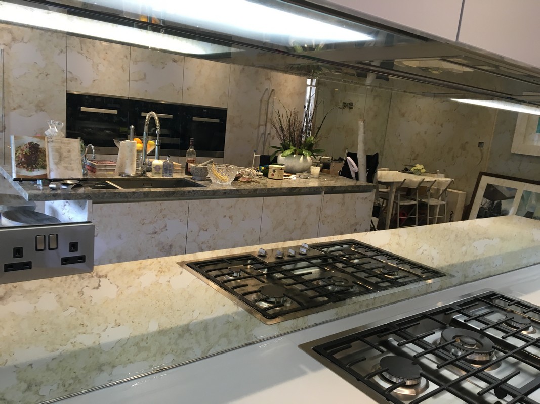 Mirror glass splashback in Holloway luxury kitchen
